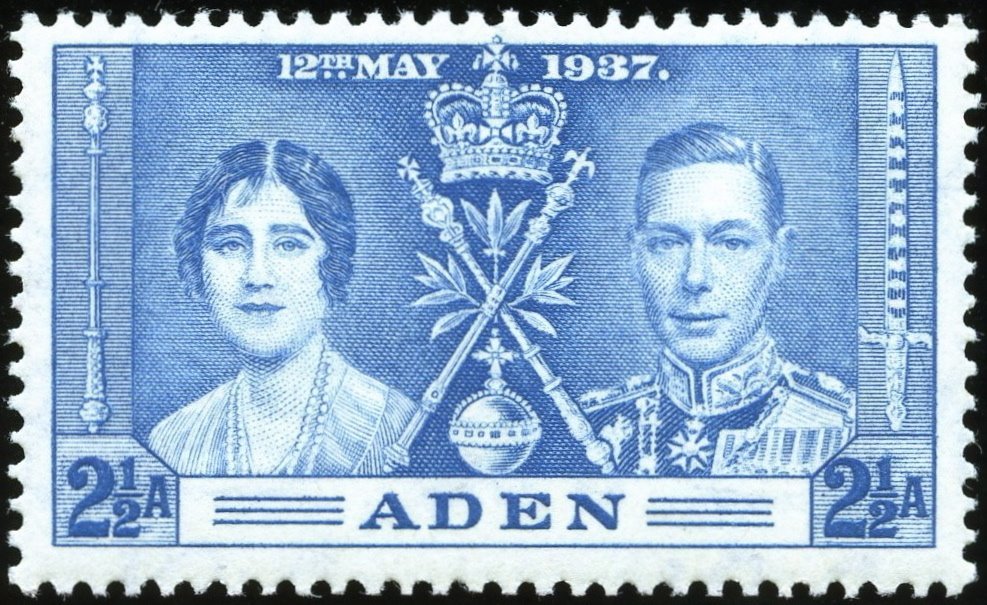 The Royal Couple and insignia of the Crown