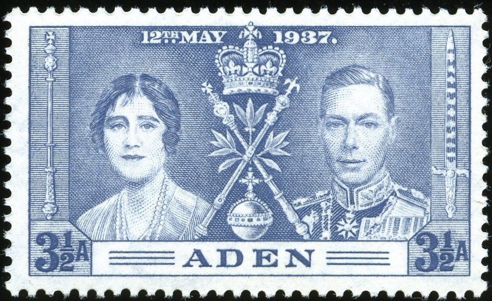 The Royal Couple and insignia of the Crown