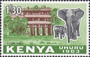 Stamp, African Elephant (Loxodonta africana) in front of a Hotel, Kenya,  , Tourism, Elephants