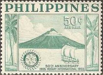 Albay volcano on Luzon, sailing boat & Rotary badge