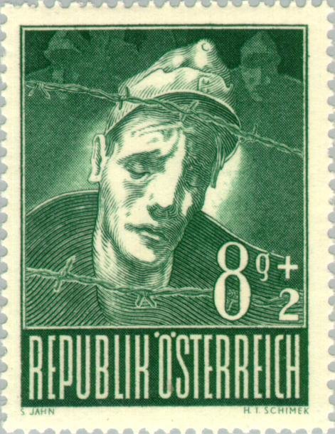 Soldier behind barbed wire