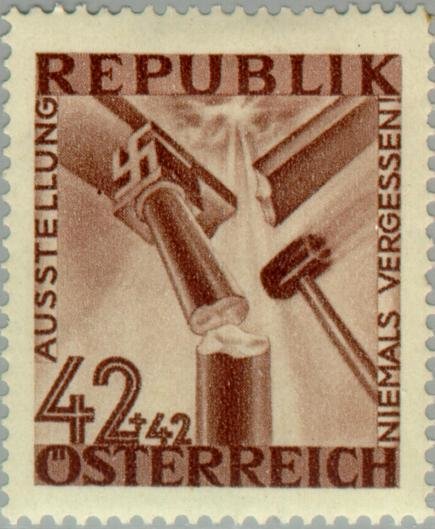Hammer crushing a pillar with swastika capital