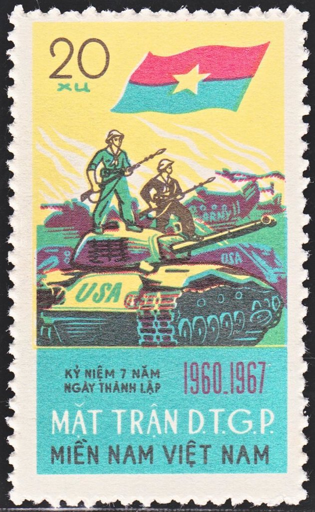 Two soldiers on top of a captured tank