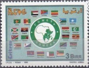 Emblem surrounded by country flags