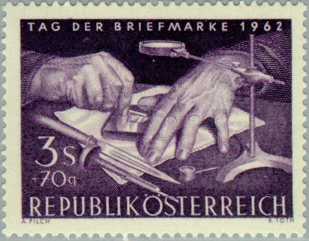 Stamp engraver working