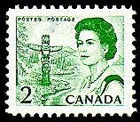QE II, totem pole and forest region on the Pacific coast