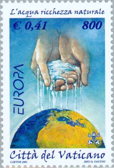 Hand pouring water on the world