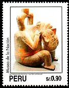 Mochican Art - Figure holding severed head