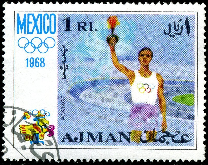 Athlete with Olympic flame