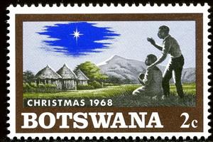 Stamp, Native family with child, Christmas star on African Landscap, Botswana,  