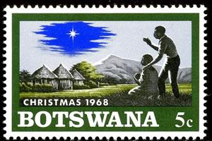 Stamp, Native family with child, Christmas star on African Landscap, Botswana,  