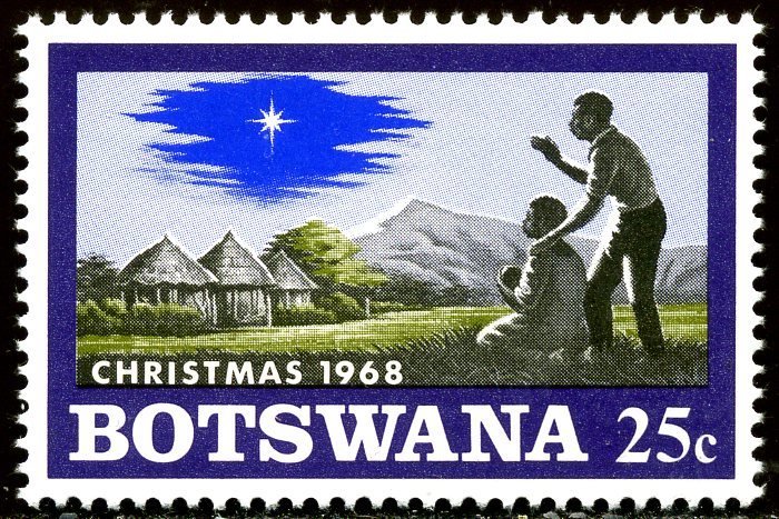 Native family with child, Christmas star on African Landscap