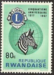 Lions Emblem, Globe and Plains Zebra (Equus quagga)