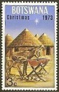 Ass and foal, African huts