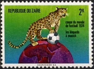 Leopard (Panthera pardus) with Ball on Globe