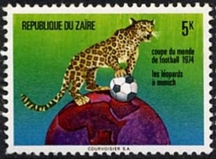 Leopard (Panthera pardus) with Ball on Globe