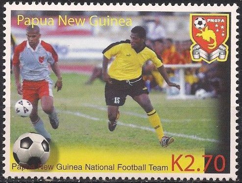 White/Red & Yellow/Black jerseyed Soccer players in action