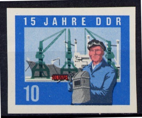 Welders, ship on the quay