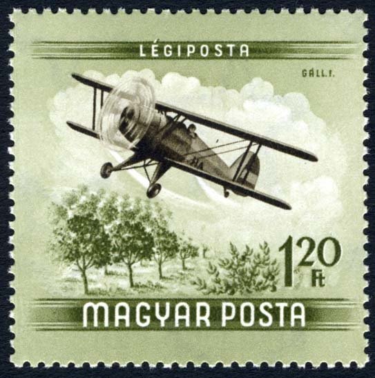 Biplane Letor C4 sprinkling an orchard
