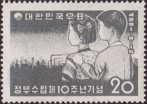 Children looking at industrial growth