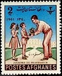 Children giving flowers to teacher