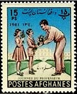 Children giving flowers to teacher
