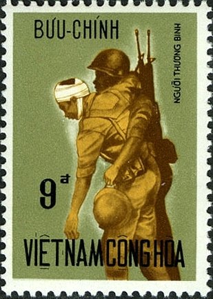 Soldier Helping Wounded Man