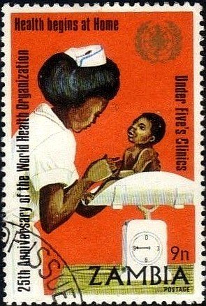 Nurse Weighing Baby