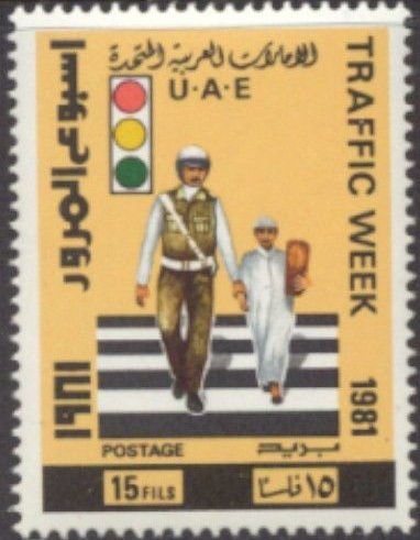 Crossing guard, students and traffic light
