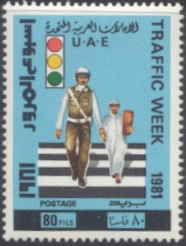 Crossing guard, students and traffic light