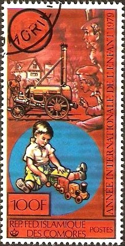 Boy Playing With Train