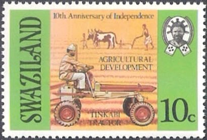 Tinkabi tractor and ox-drawn plow