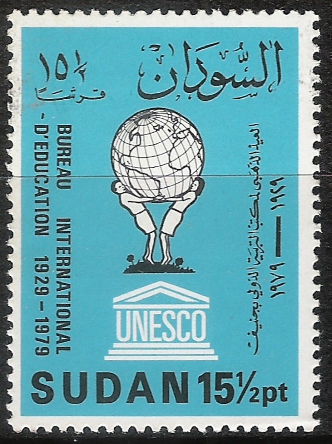 UNESCO emblem and children holding globe