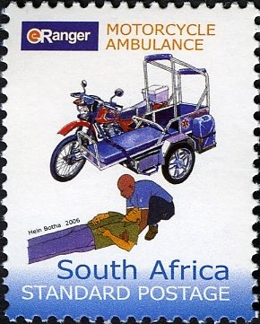Motorcycle ambulance, paramedic assisting man