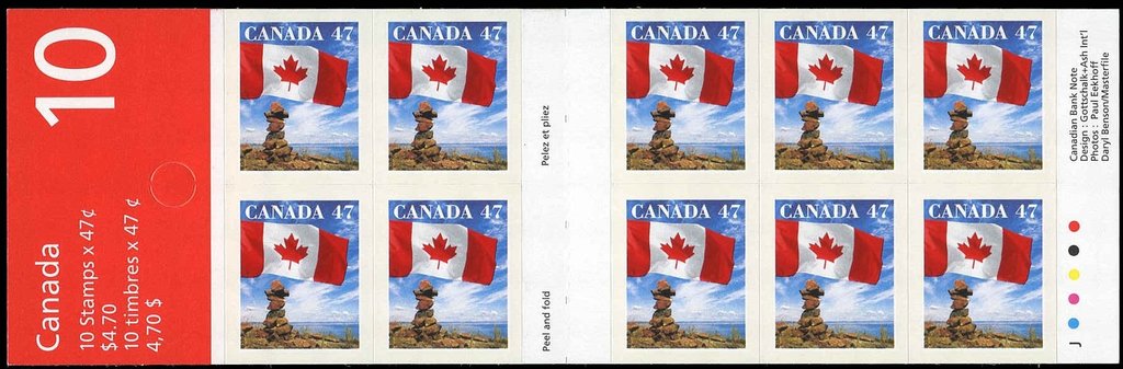 Canadian Flag and Inuit Cairn