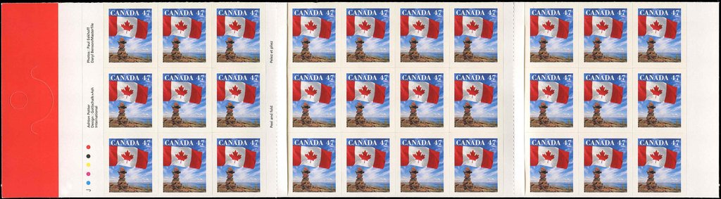 Canadian Flag and Inuit Cairn