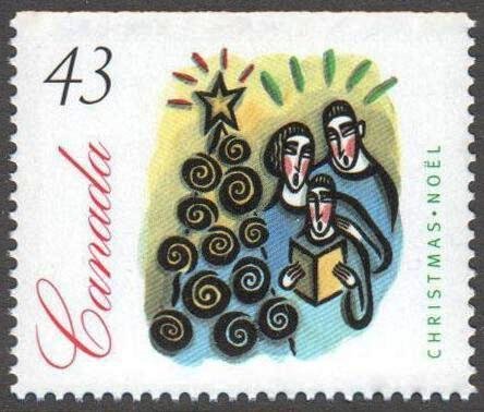 Group of People Gathered Around a Christmas Tree