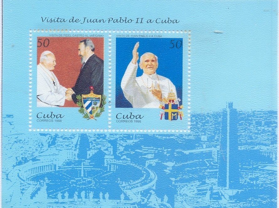 With Fidel Castro and waving