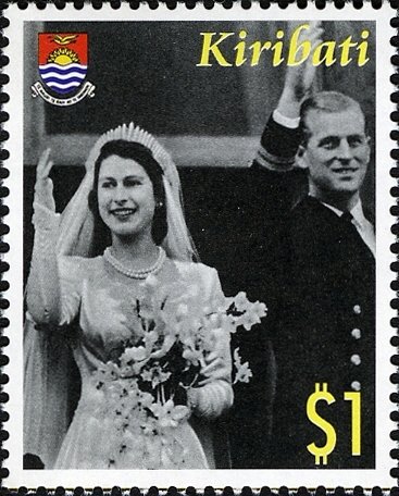 Bride and groom waving