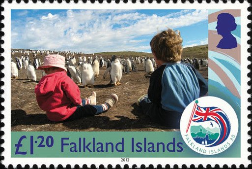 Children with penguins