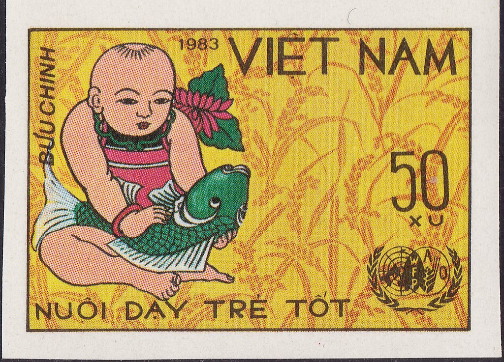 Infant with fish