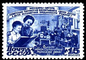 Mother with her son are reading. Pupils at the lesson