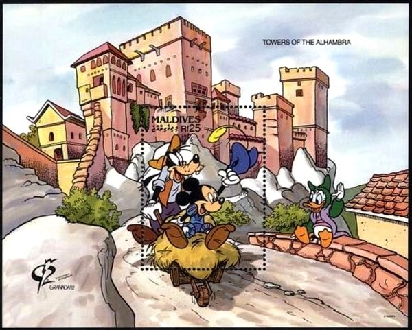 Goofy and Mickey outside Towers of the Alhambra