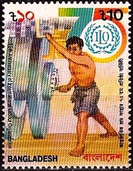 Man rotating gearwheel