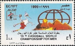 Mascot with ball, Sphinx, pyramids, globe