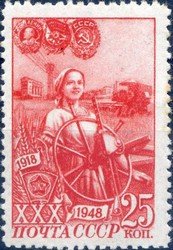 Girl the collective farmer at the helm