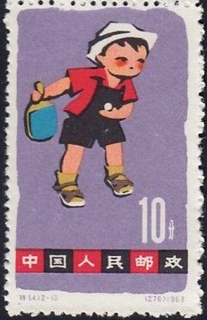 Child playing table tennis