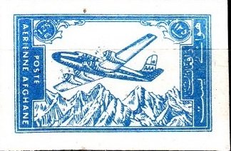 Douglas DC-6 over Mountains