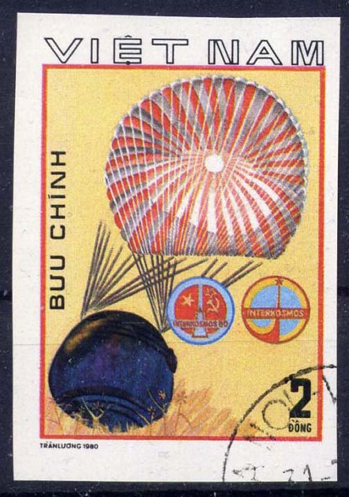 The Soyuz 37 descent module returns on parachutes