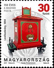 Post box with an emptying mechanism